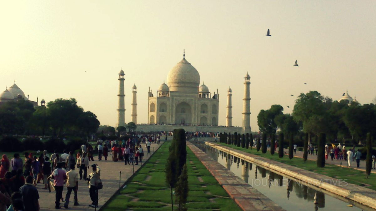 Sunrise view of the Taj Mahal in Agra glowing in golden morning light