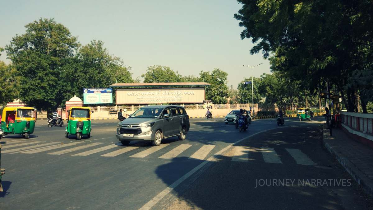 Vehicles traveling on Indian roads representing the importance of travel insurance and trip protection