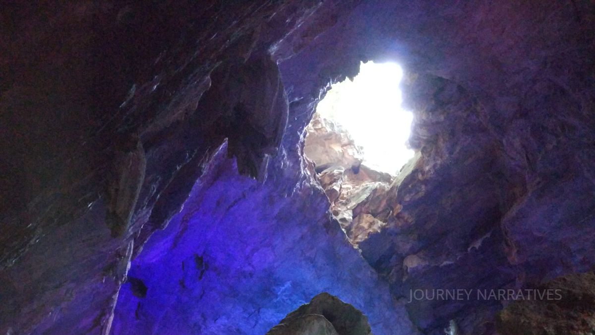 Interior rock formations inside Borra Caves shaped by centuries of underground water activity