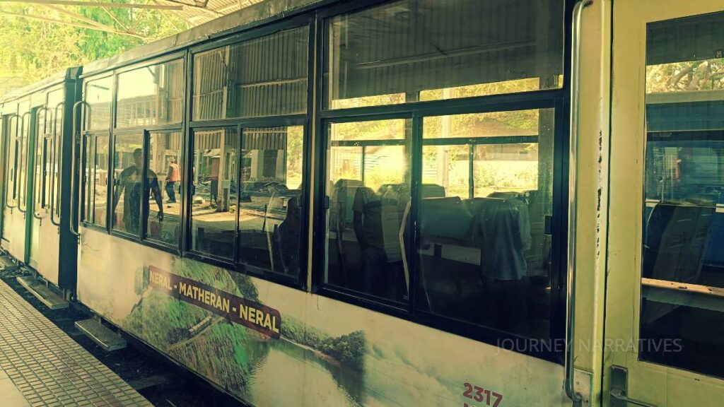 Heritage toy train journey through scenic mountain landscapes in India