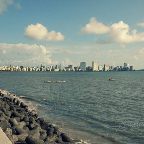 Marine Drive in Mumbai stretching along the Arabian Sea with its iconic curved waterfront promenade